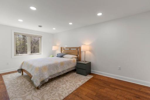 Lower level bedroom (16 x 10 feet) with hardwood flooring and plenty of recessed lighting!