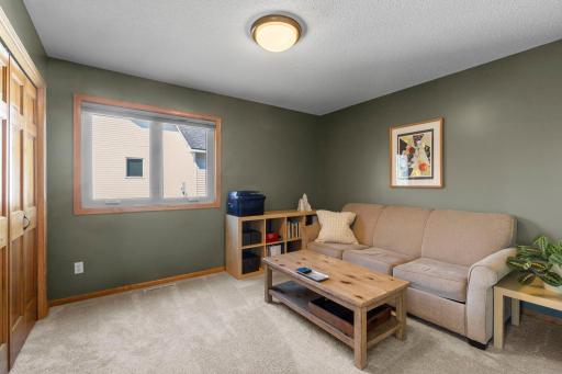 This spacious main level bedroom would be perfect as a main level office!