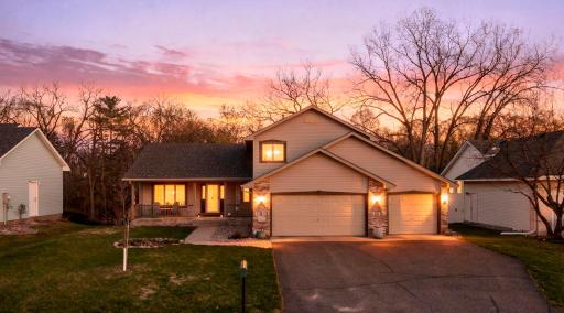 Beautiful six bedroom, four bath home on a wooded lot in demand North Maplewood!