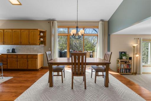Spacious informal dining room with direct access to a large deck and the great outdoors!