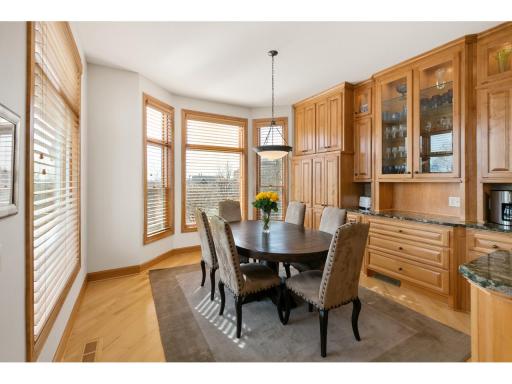 Ample storage carried into the informal dining space