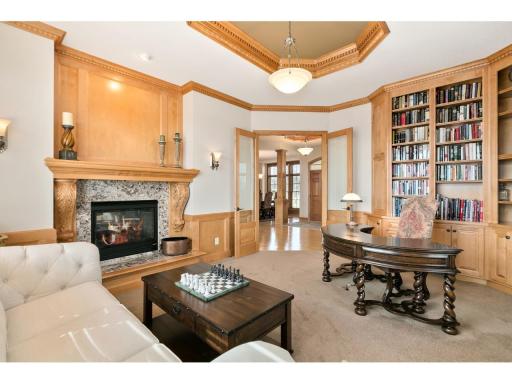 Enjoy a book or game by the two sided fireplace
