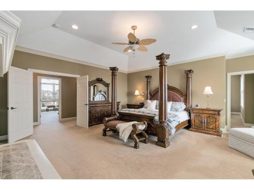 Enormous master suite is your own private oasis with a woodburning fireplace, coffee bar with mini fridge, five piece bath and walk in closet.