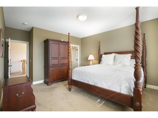 One of four upper level bedrooms complete with private en suite bathroom