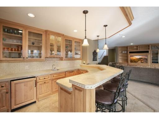 Full wet bar with access to the wine cellar