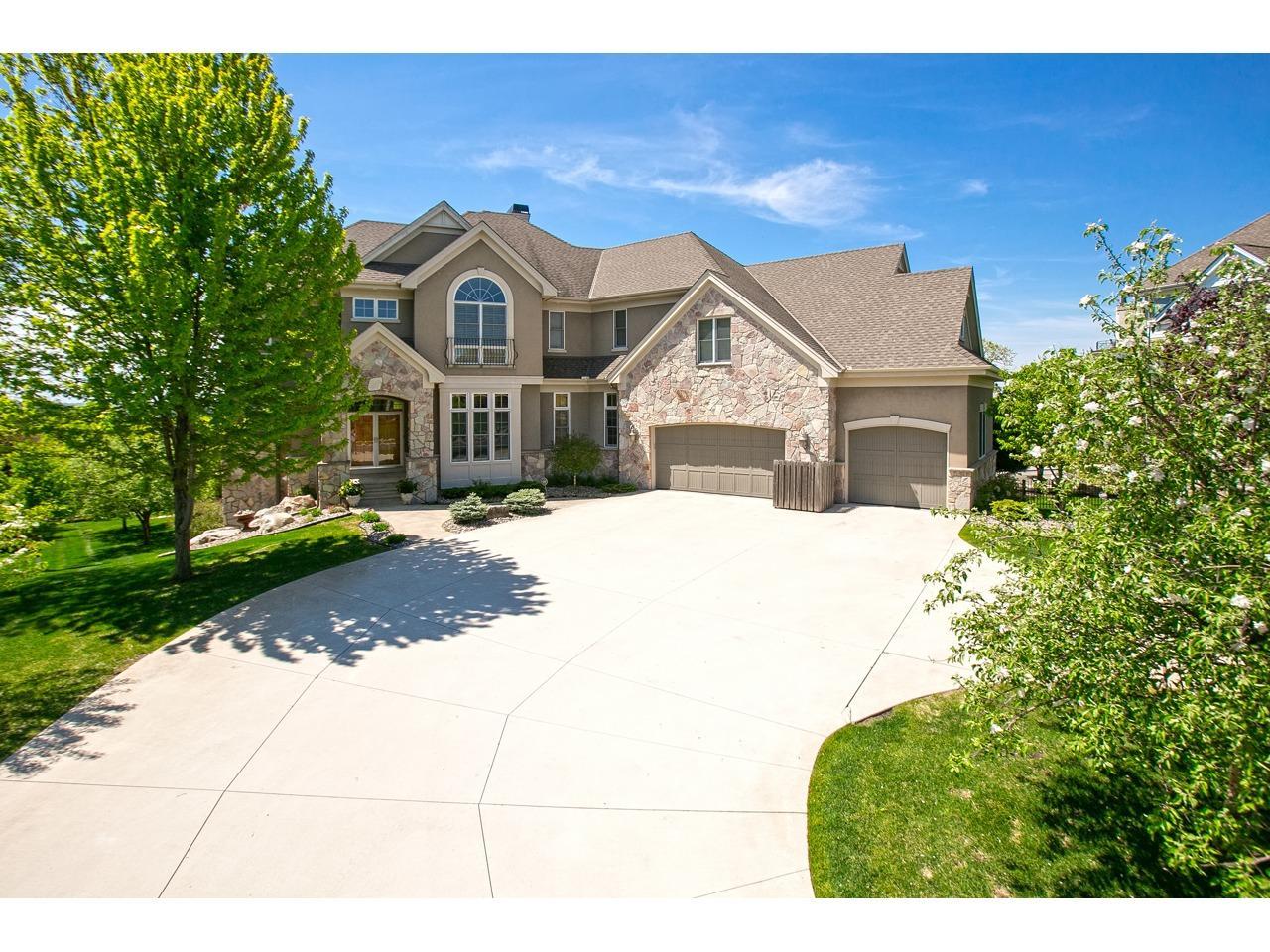 Expansive 5 car garage with 2 lifts, heated flooring with drains, separate staircase to home plus finished loft suite above garage.