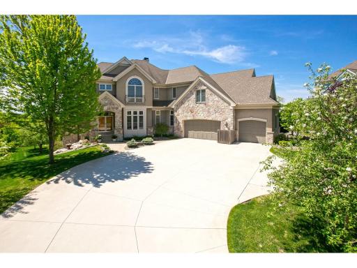Expansive 5 car garage with 2 lifts, heated flooring with drains, separate staircase to home plus finished loft suite above garage.
