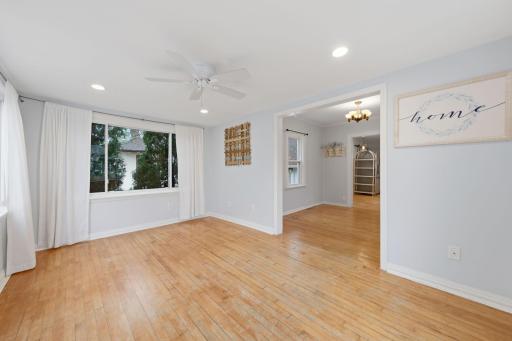 Hardwood floors gleaming through the home, bright open and light.