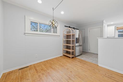 Dining room off the the kitchen, also boasts hardwood floors.