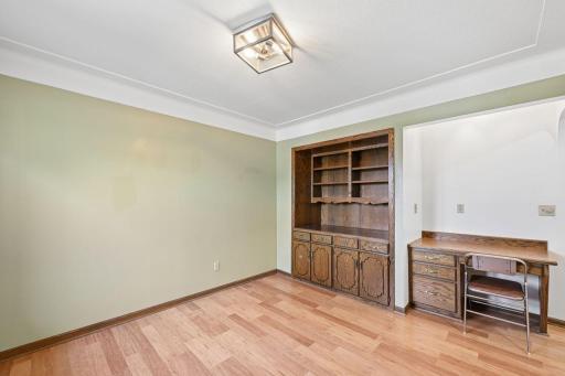 This a lovely space with built-ins and original coved ceilings