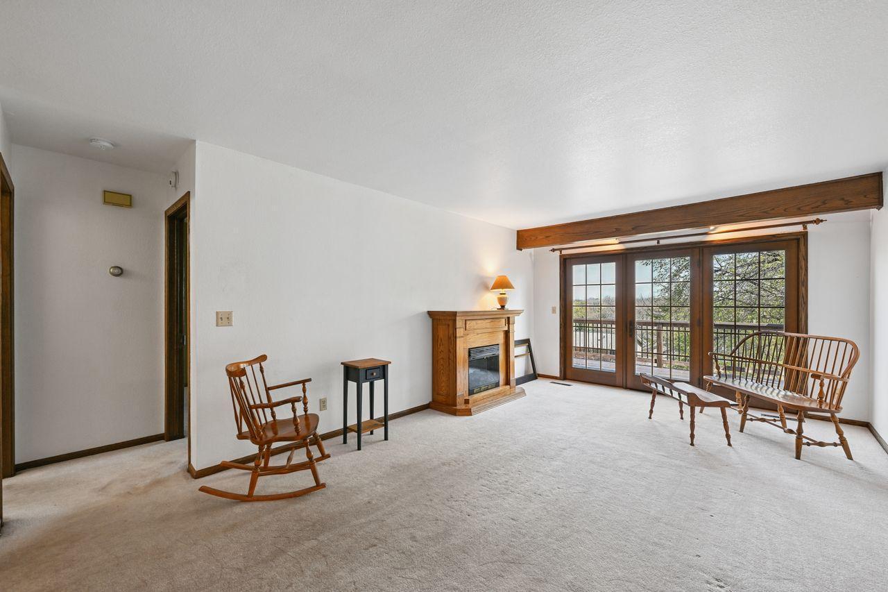 Living room walks out to a large balcony