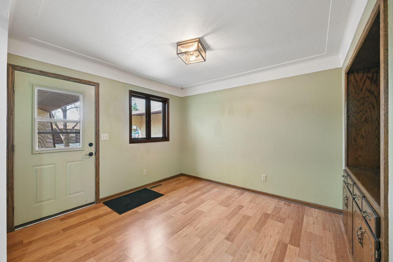 You enter the unit in the dining room.