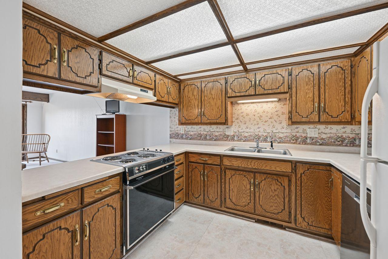 The kitchen offers lots of cabinet space