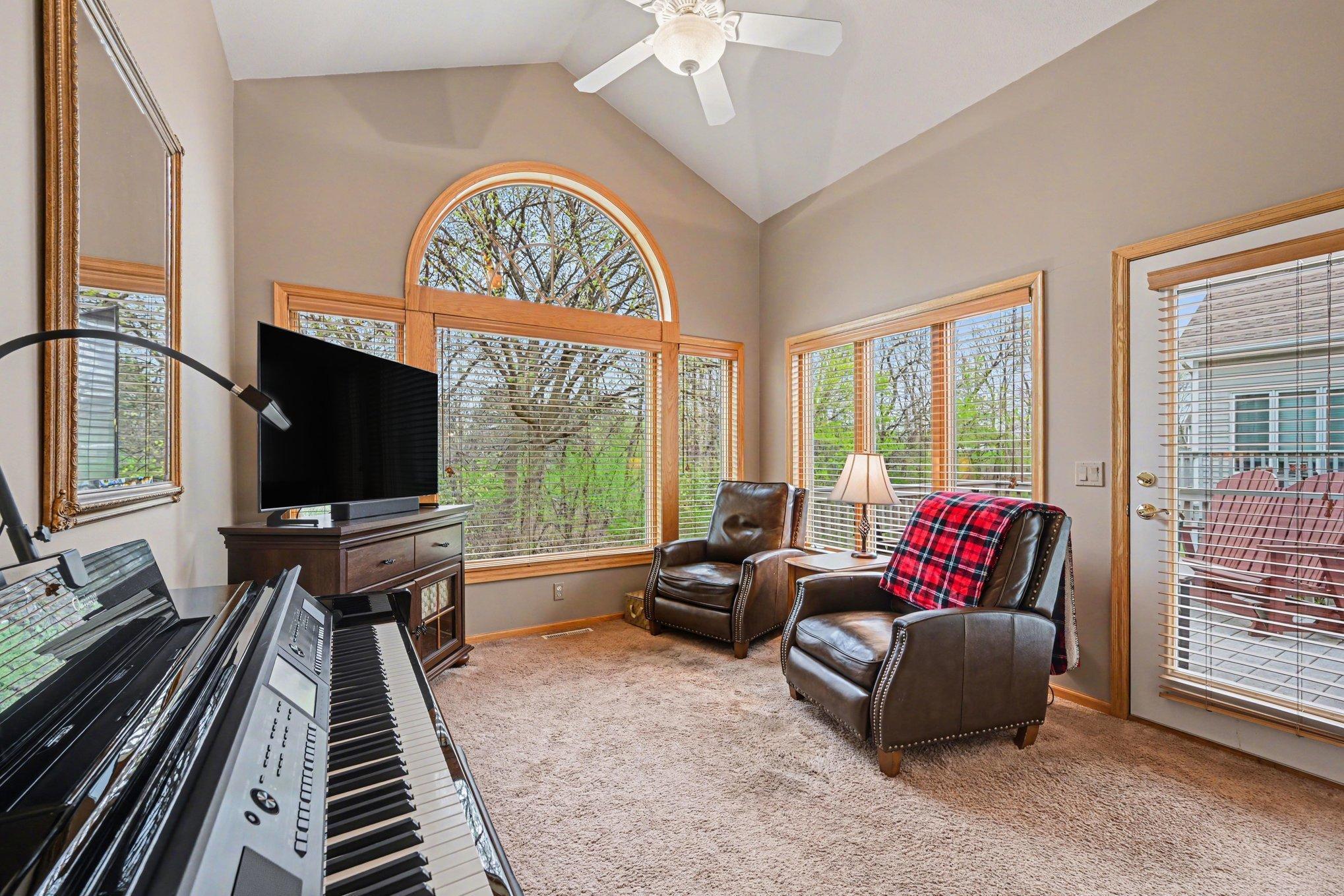 Cozy porch/sunroom opens to deck