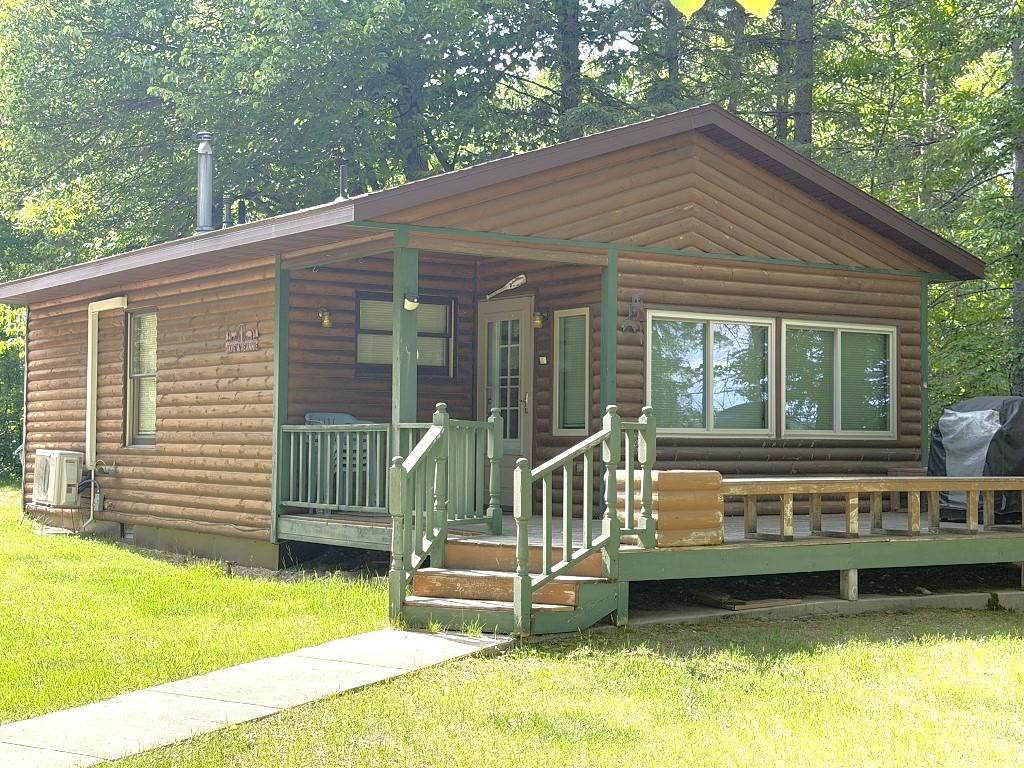 Enjoy your summer on Two Inlets Lake and move into this furnished cabin that is in Two Inlets Association. This will give you time to relax and let someone else do the work!