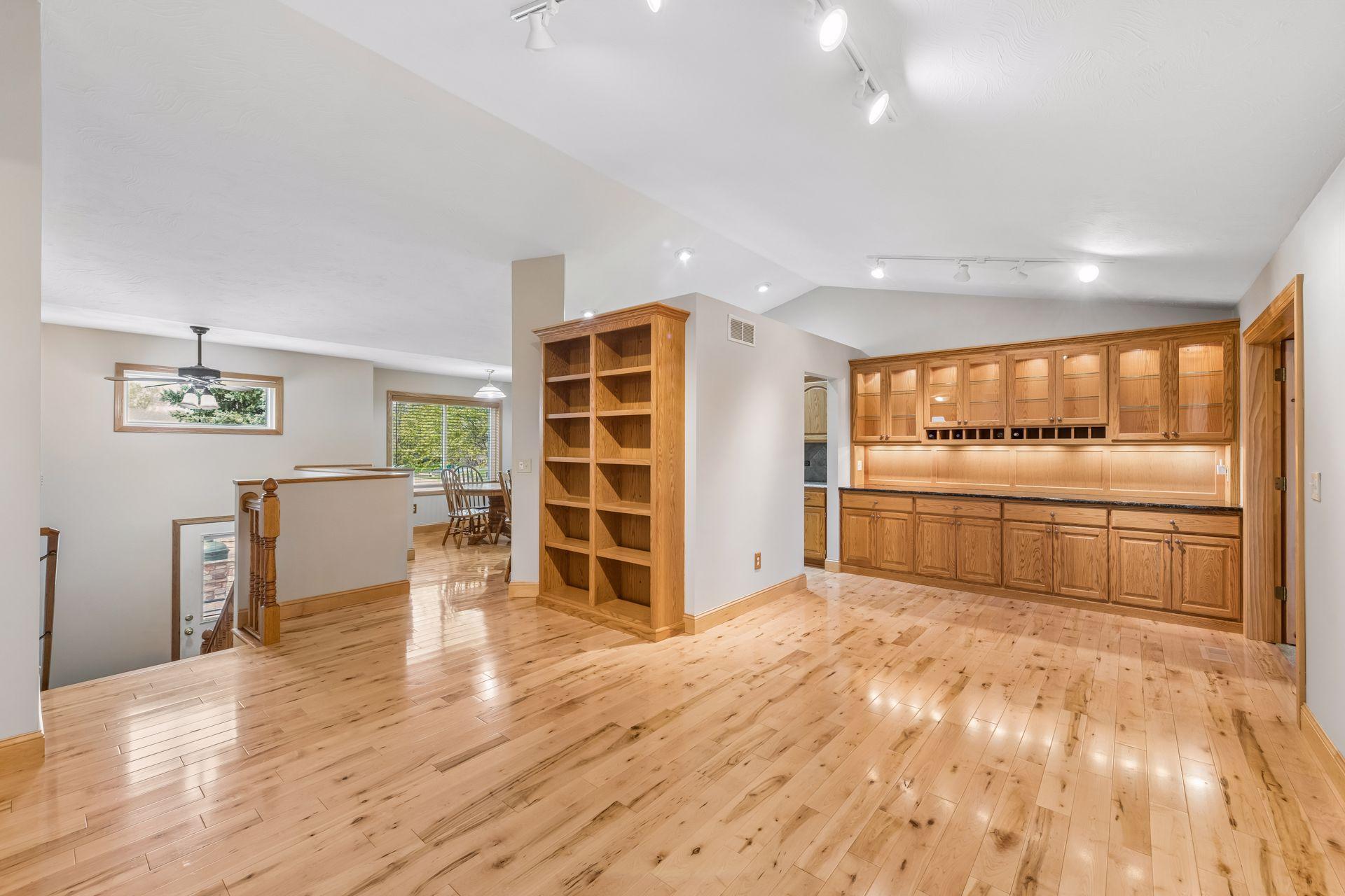 This versatile area can be used as a living room or a more formal dining room. Built-in bookcases give the area a lot of character.