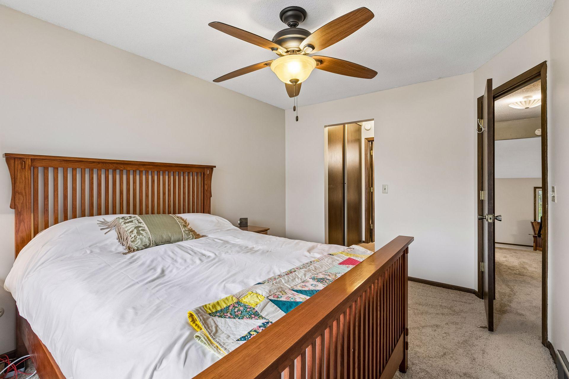 The primary bedroom is a great size, with a large walk in closet, and a ceiling fan.