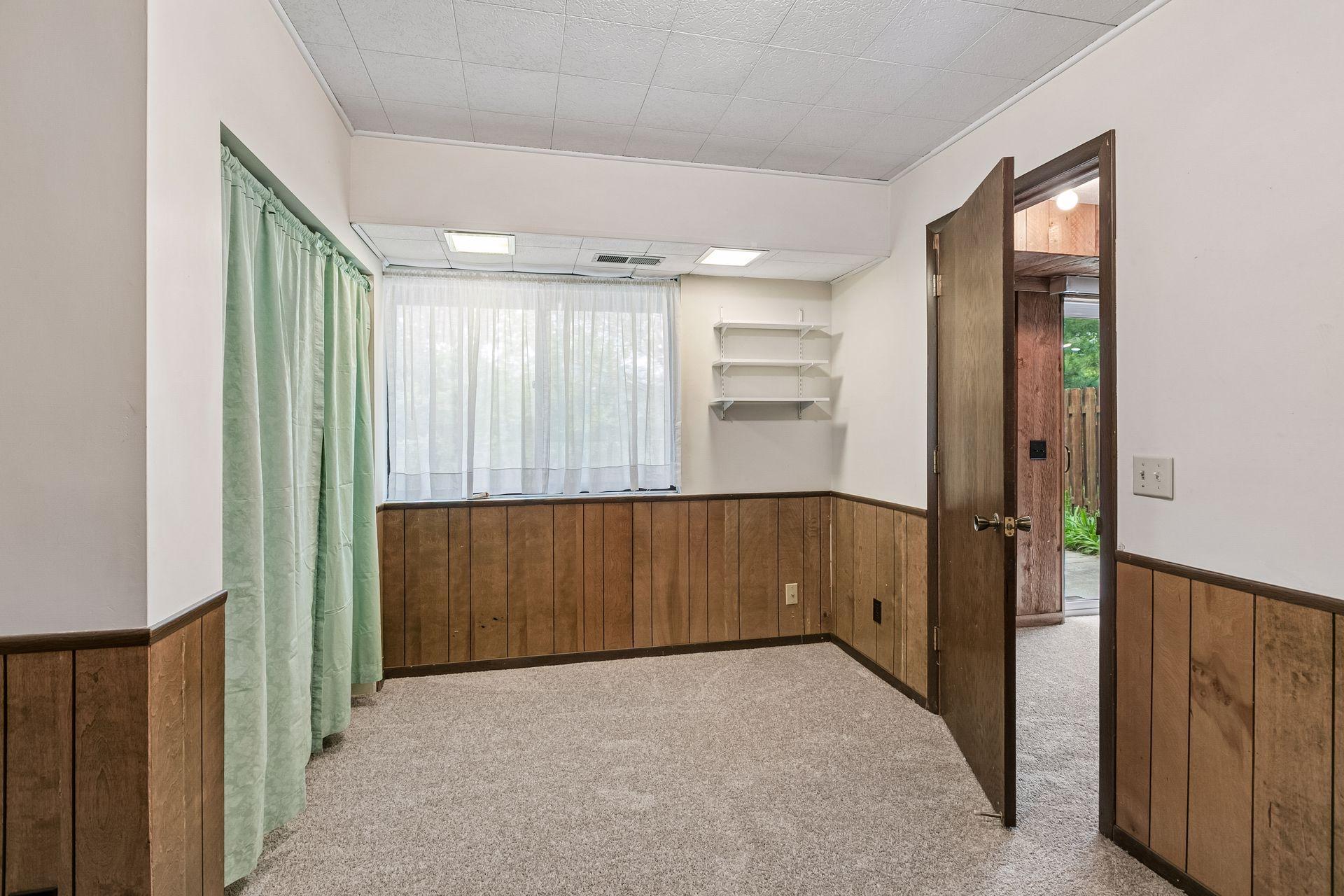 The fourth bedroom is located downstairs.