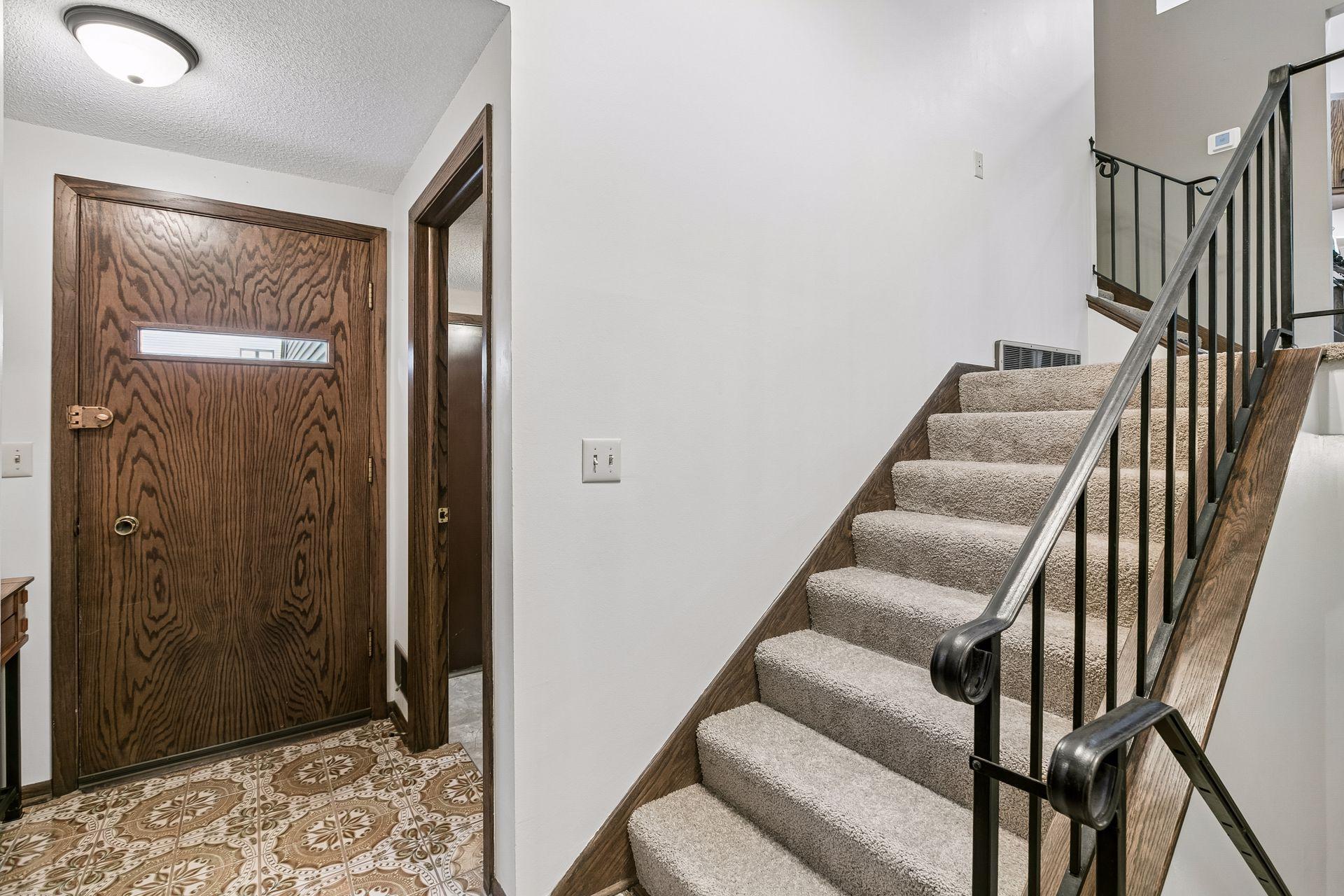 Your front entryway is spacious; a great place to greet guests.