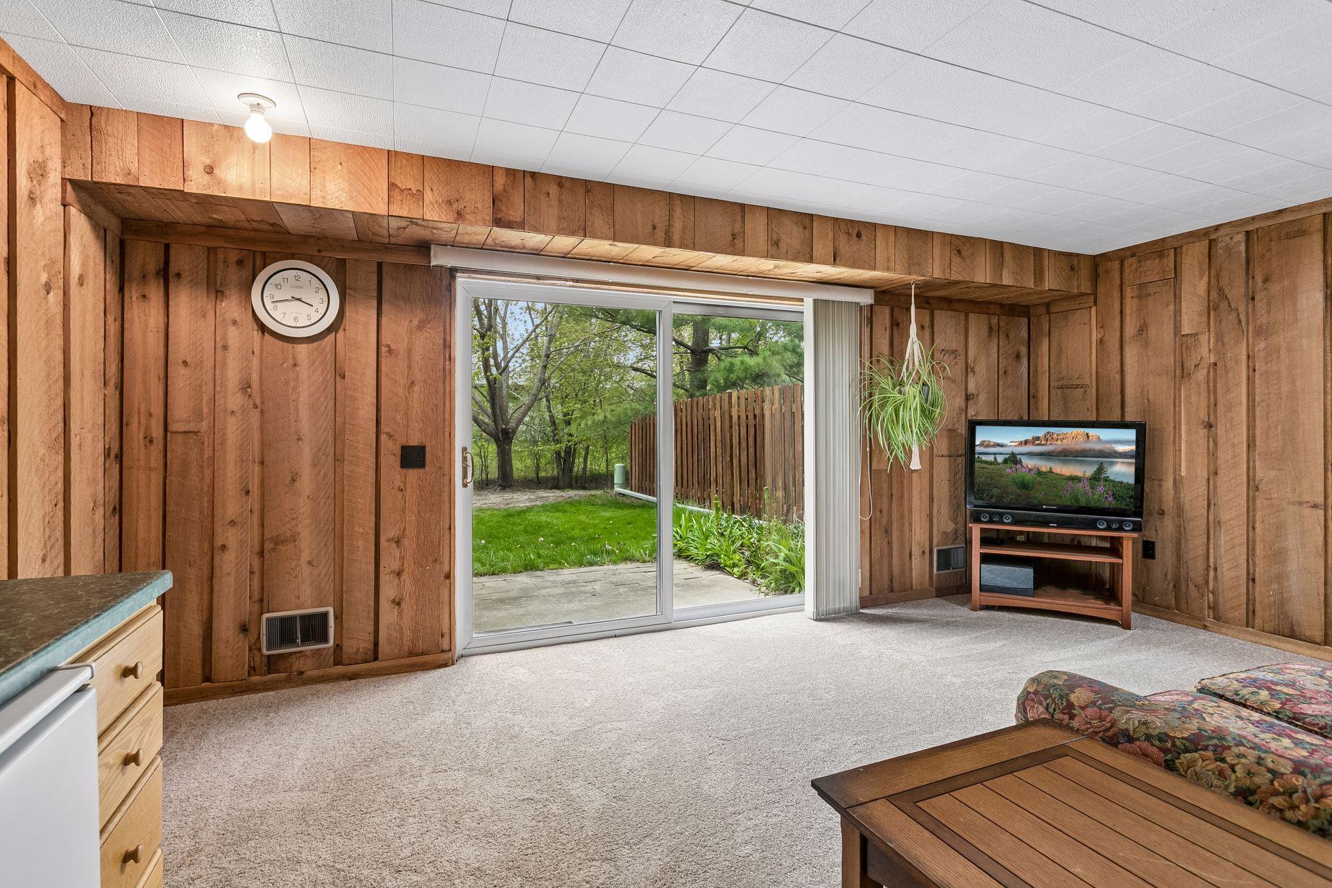 The family room here is a walkout with patio doors out to your backyard.