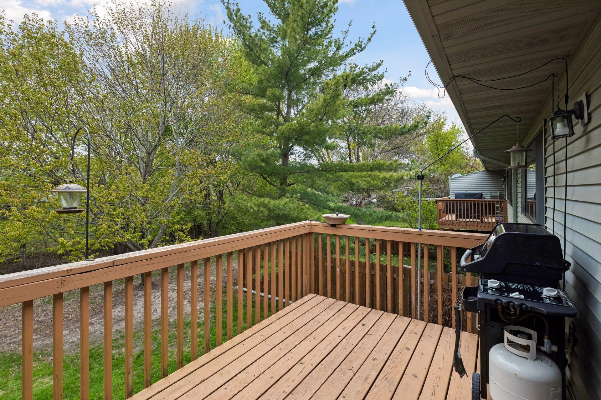 Your private deck overlooks a beautiful green/water space.