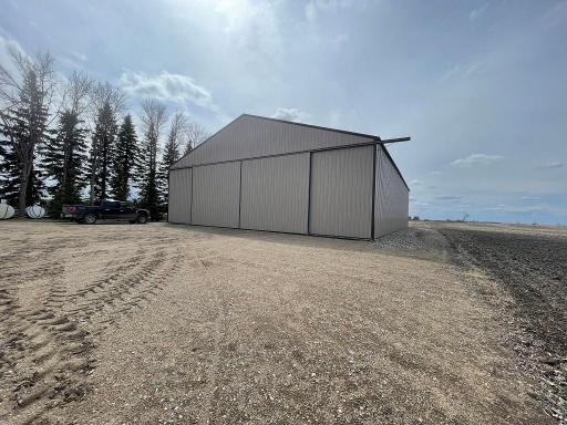 Storage Building, 83 x 60 with 17' side walls and 16' door. Lot is 1.72 acres and situated on main township road.
