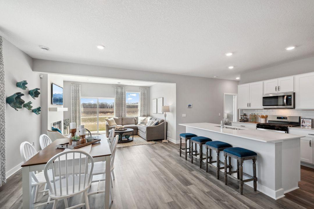 Open floor plan. Photo is of a past model home, finishes, selections, layout to vary.