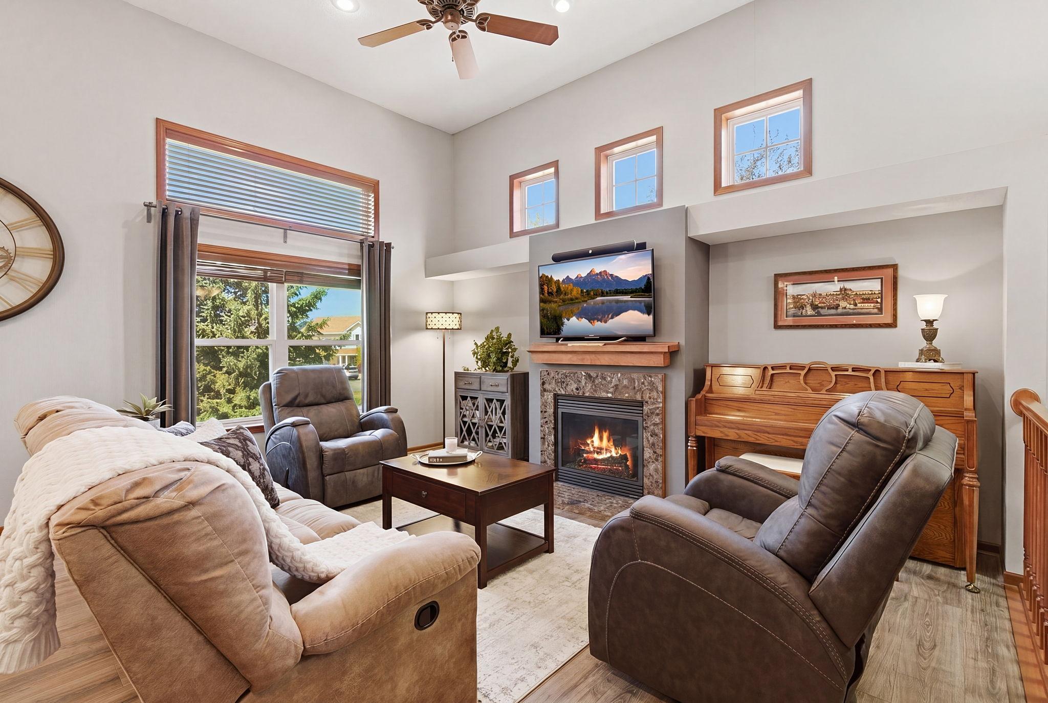 Abundant windows and soaring ceilings flood the Great Room with natural light!