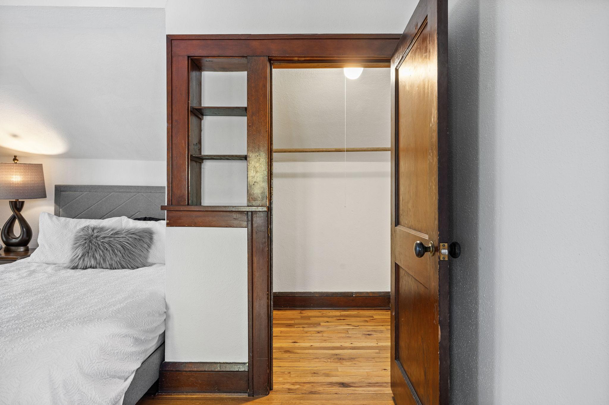 Walk-in closet in upstairs primary bedroom