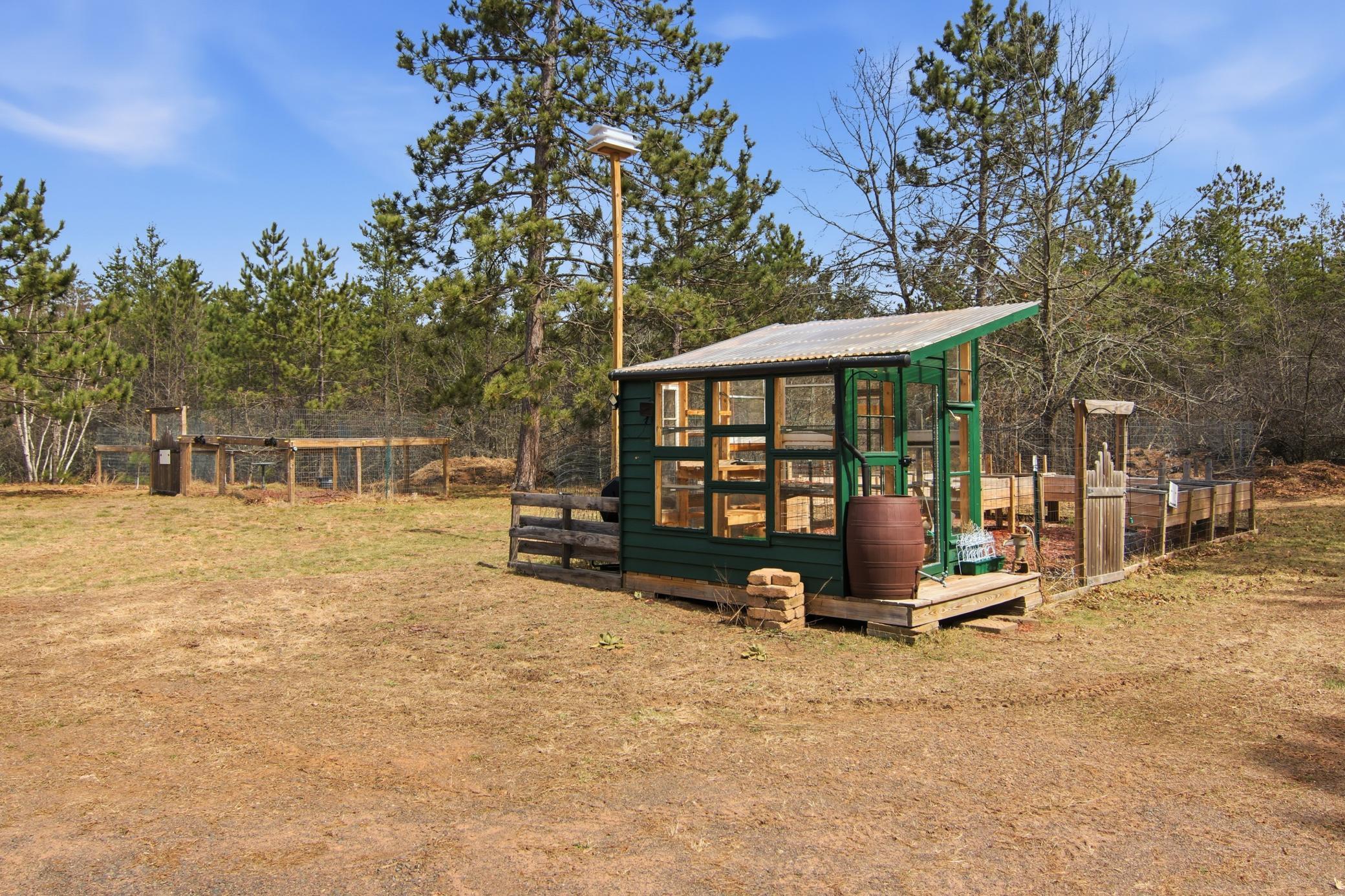 Green house, veggie garden and fruit garden