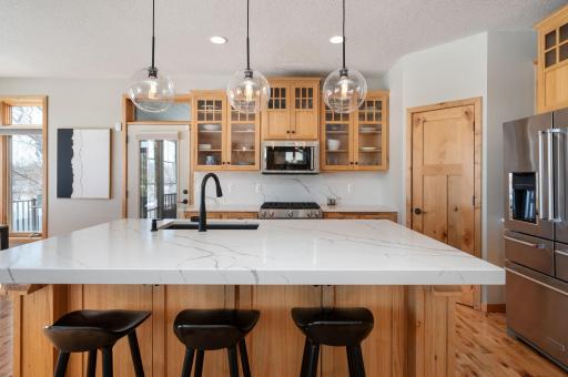 Adjacent to the kitchen is the 3-season porch