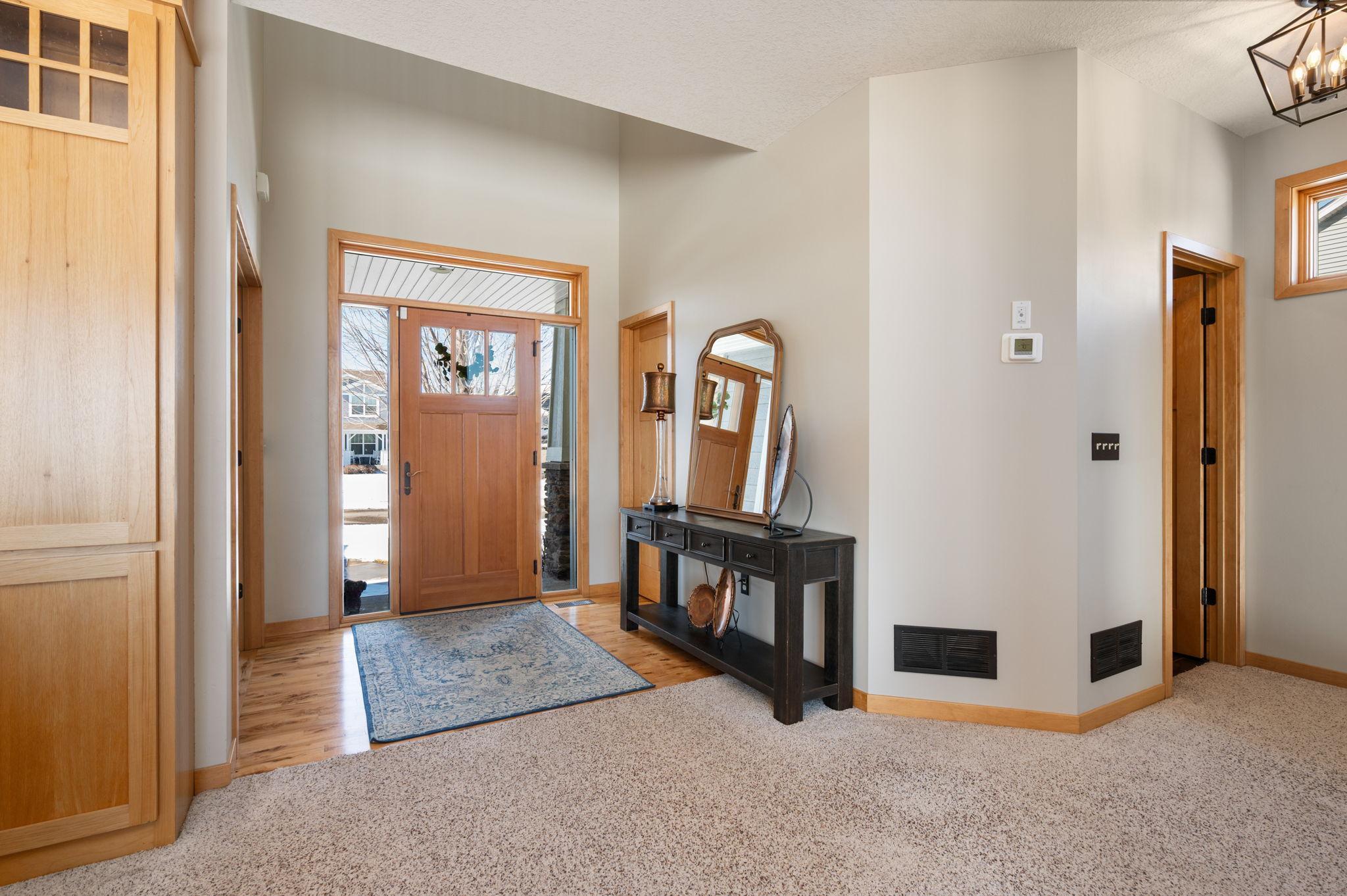 Inviting entrance to home is spacious and there is a walk-in closet