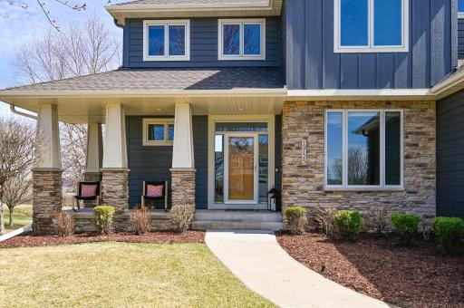 Welcoming entrance with a covered porch to sit and enjoy!