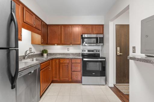 Kitchen - Tile Floors, Wood Cabinets, Under Cabinet Lighting