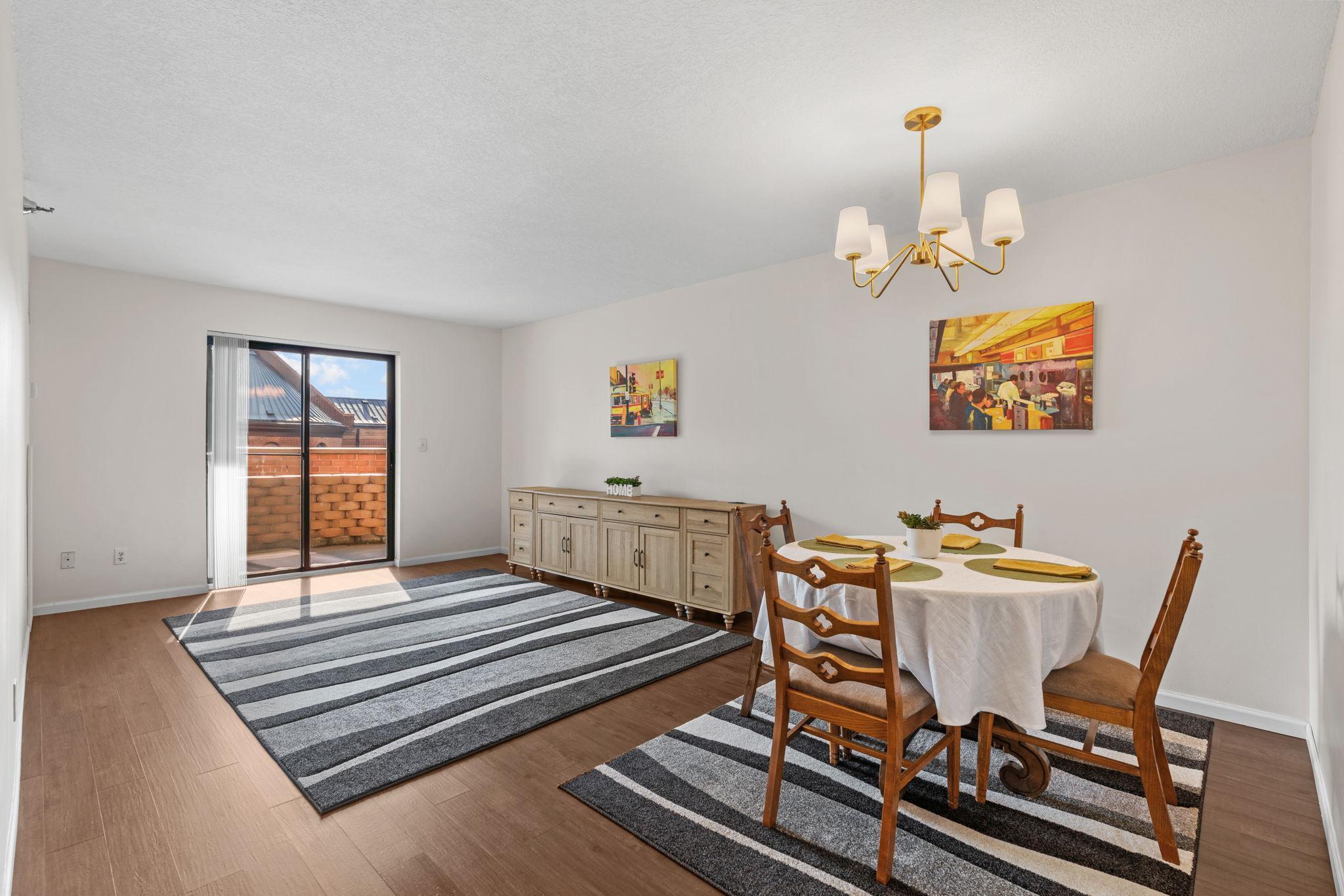 Living Room and Dining Room with New Brushed Metal 5 Light