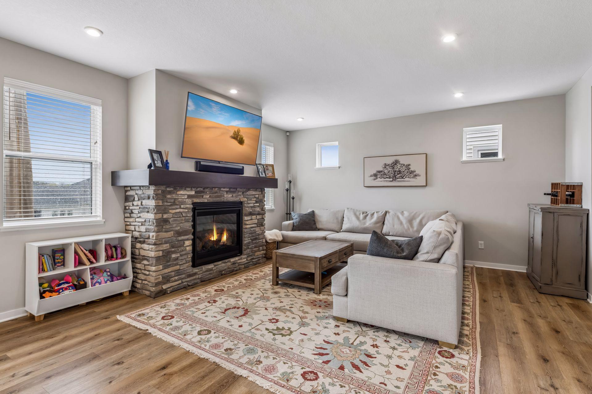 Living room features gas fireplace
