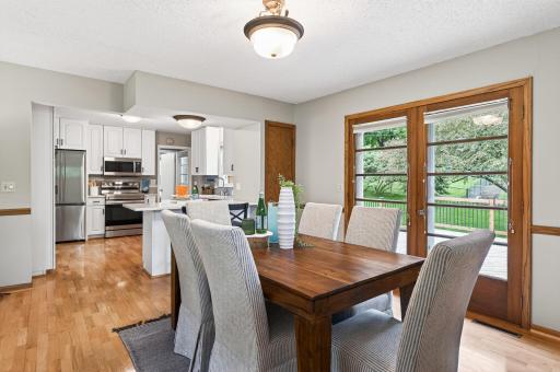 Dedicated dining area with backyard views and natural light
