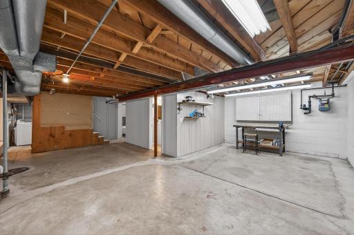 Large lower-level space ready for a workshop, gym, or additional living area
