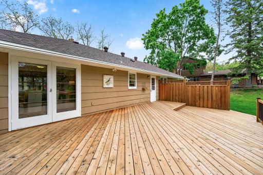 Seamless indoor-outdoor living with direct access to the backyard deck