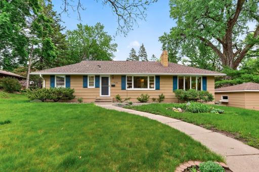 Classic Golden Valley rambler with timeless curb appeal