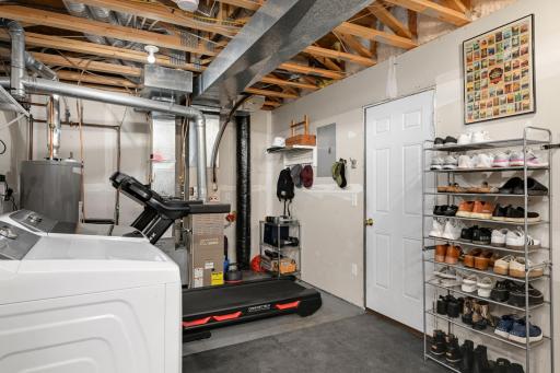 Entry from the attached 2-car garage with extra space for storage.