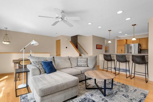 The spacious living area is open to the kitchen, which is perfect for cooking and entertaining.