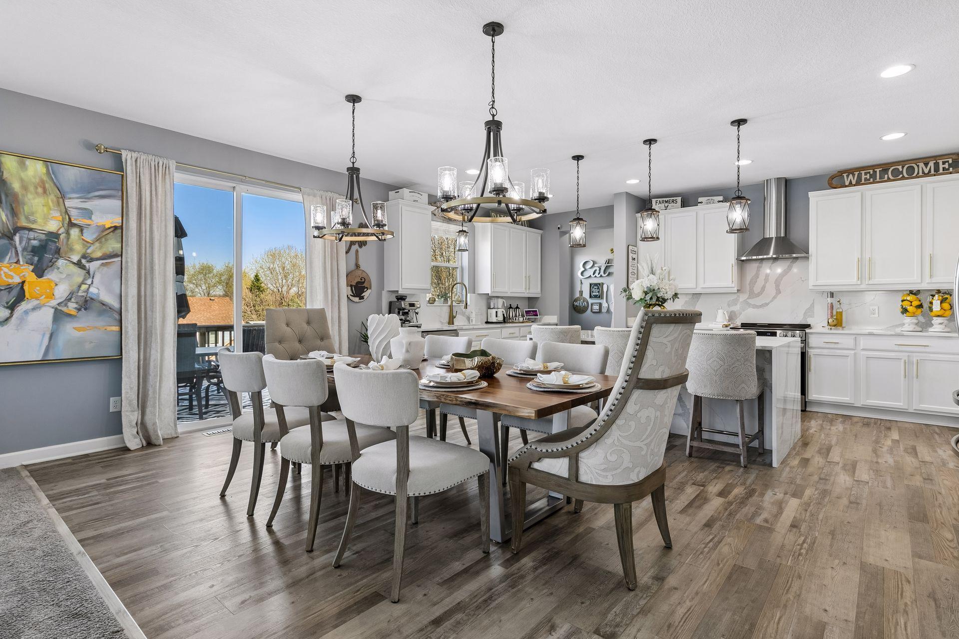 Dining Looking into Kitchen and Slider to Deck