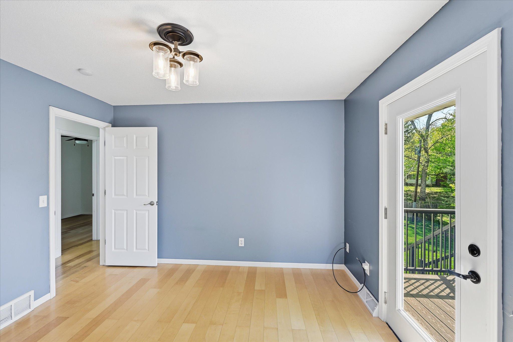 Main level bonus room with walkout to deck!
