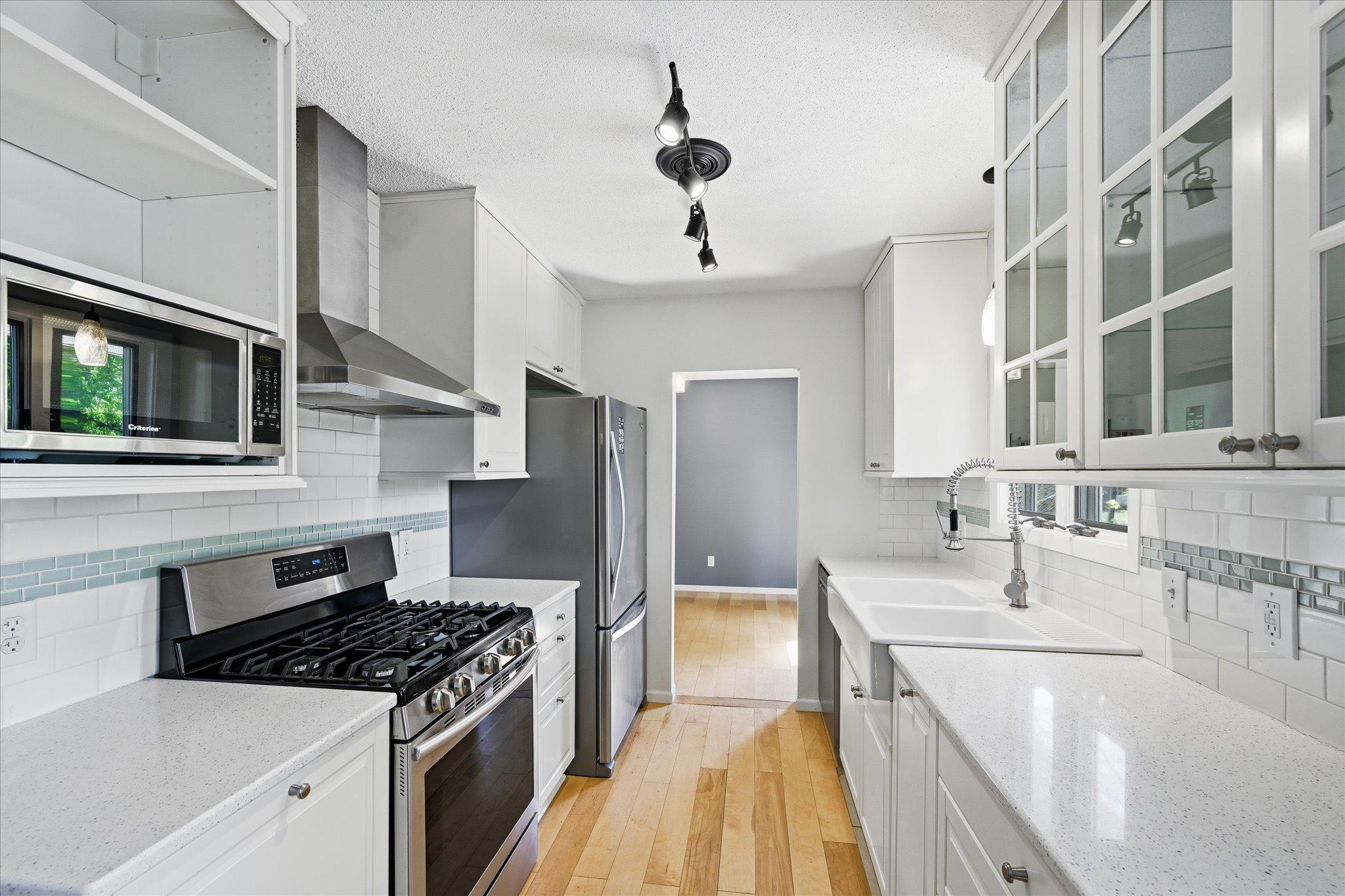 Beautiful kitchen featuring quartz countertops and custom cabinetry