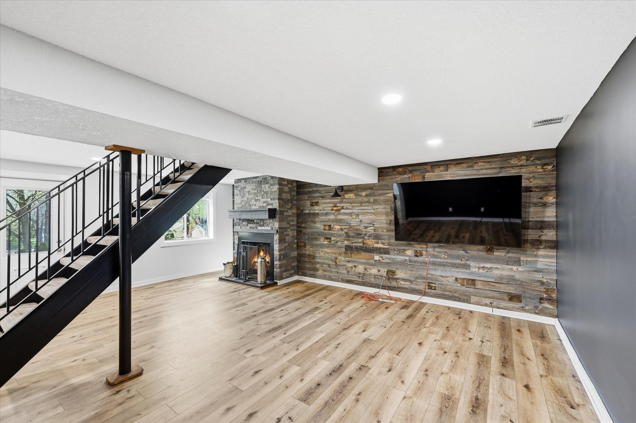Newer flooring throughout the lower level