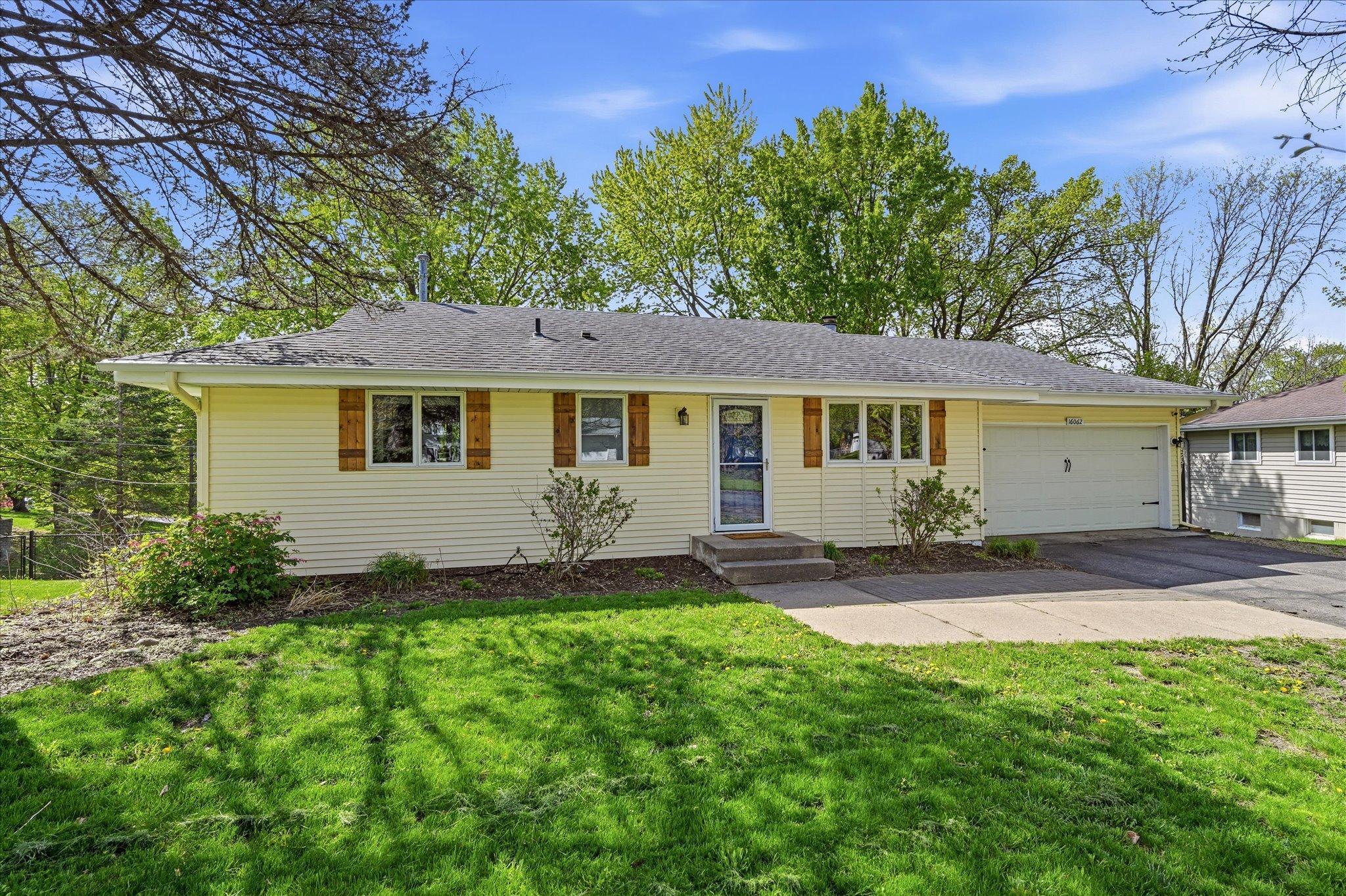 Welcoming curb appeal on a spacious quarter-acre lot