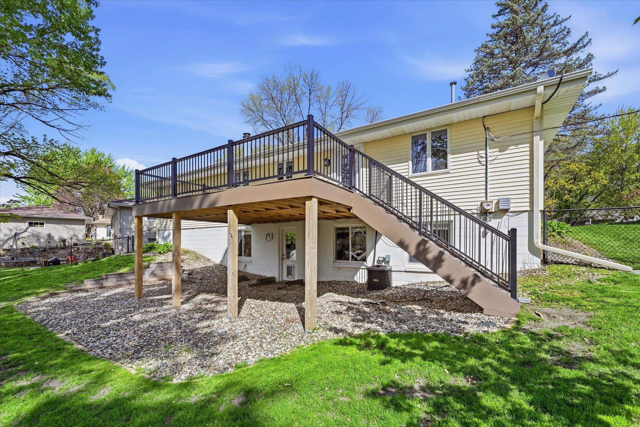 Deck is perfect for grilling and outdoor relaxation - easy access to backyard too