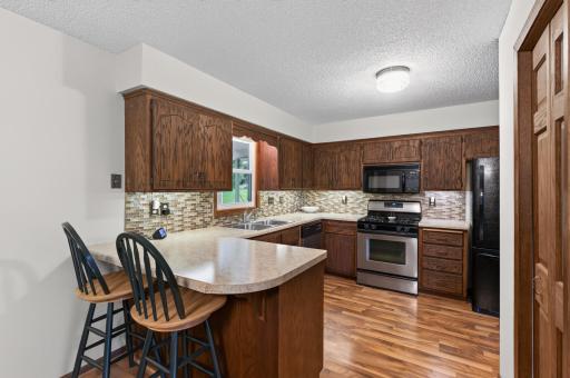 Freshly painted kitchen with convenient design.