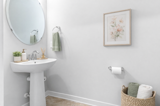 Main level half bath, three total bathrooms.